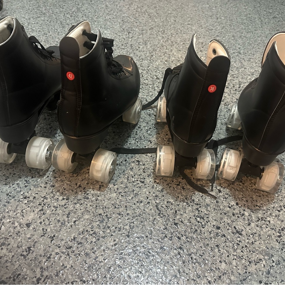 Black Roller Skates with White Wheels that lights up. Size 38 and 42